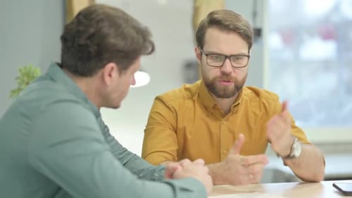 Talking Business People Discussing Work in Office