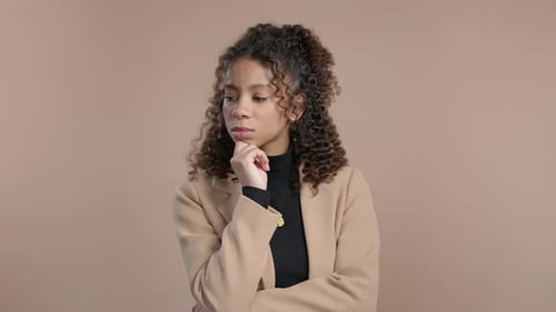 Thinking Around Stylish Woman Beige Background Puzzled Teenager Looking Answer