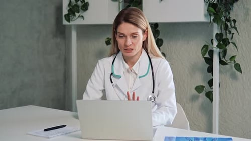 Doctor Woman Telemedicine Video Call Communication in Office