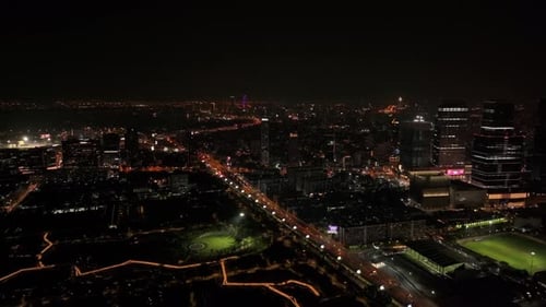 Night lights outlining downtown Bangkok buildings from above