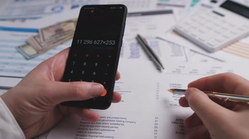 Accountant Using Calculator App