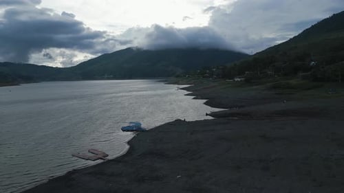 Aerial Lake Calima at Sunset Close to Ground. Pull Back Shot. Valle del Cauca. Colombia