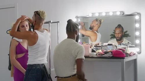 Makeup Artist Prepares Woman for Photo Shoot