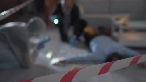 Crime Scene Investigation with Tape and Investigators