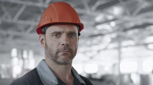 Engineer Plan of Manufacture Work. Caucasian People in Safety Hard Hat Or