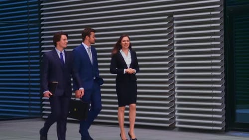 Confident Businesspersons Talking in Front of Modern Office Building Businessmen and Businesswoman