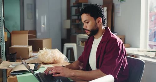 Laptop, boxes and businessman in office for logistics, delivery or supply chain with online order