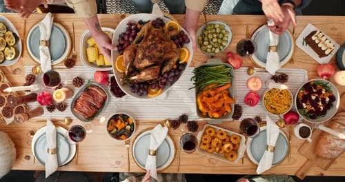 Festive Thanksgiving Table Laid with Roast Dinner Overhead