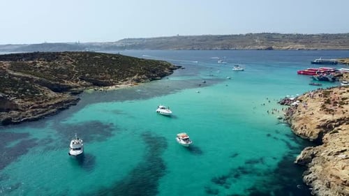 Aerial drone shot on turquoise water, Blue Lagoon, Comino Malta,
Top best beaches of Mediterranean S