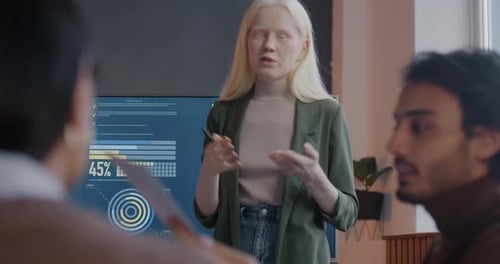 Businesswoman Giving a Presentation in an Office