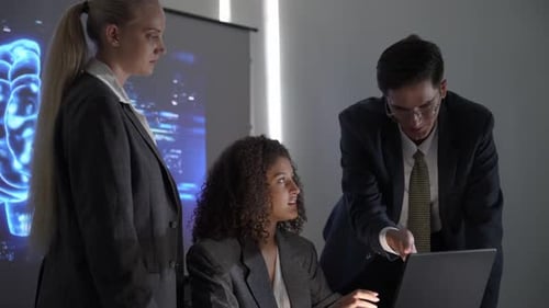 Team collaborates on technology presentation in modern office setting