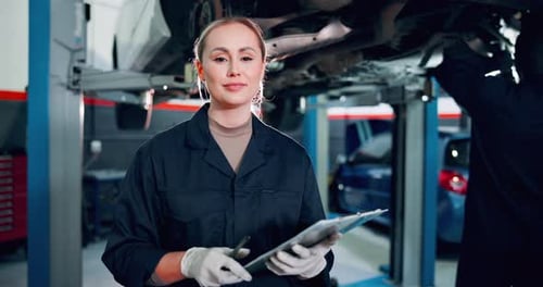 Mechanic, face and checklist with car shop, calibration or maintenance garage