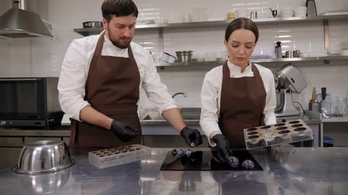 A Pastry Chef Makes Handmade Chocolates in a Professional Pastry Shop