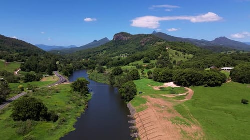 Aerial view over the Tweed River looking towards Wollumbin, Mount Warning in Northern NSW, Australi