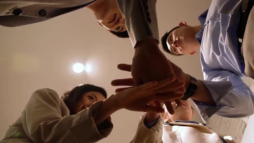 Group of business people meeting and applause with high five in office, b2b project and deal success