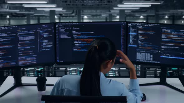 Back View Of Asian Woman Developer Having Headache While Write Code In ...