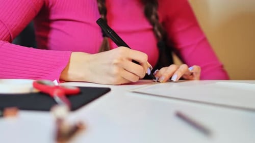 Woman Drawing on Paper Indoors, Creative Art Project