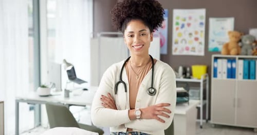 Arms crossed, doctor or face of happy woman in office for healthcare career, wellness or service