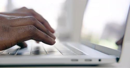 4k video footage of a businessman using his laptop at the office