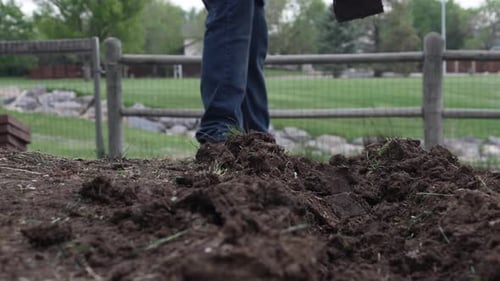 Man Is Digging On The Yard Using Pick Mattock. Close up
