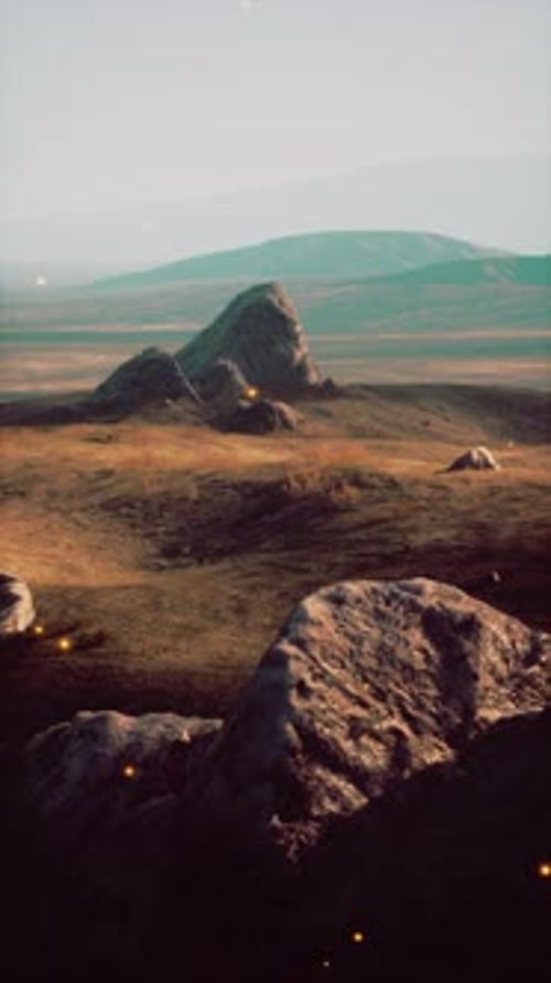 Rock Formation Amidst Illuminated Field