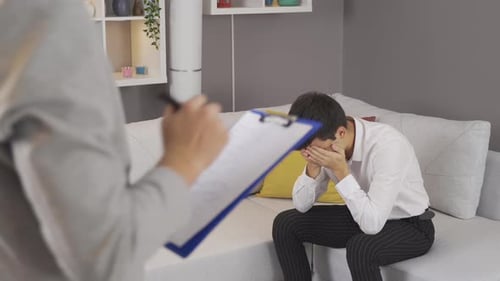 The sad man is broke and in debt.