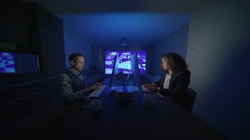Modern Office Collaboration in Low Light Enhanced By Technology for Optimal Interaction