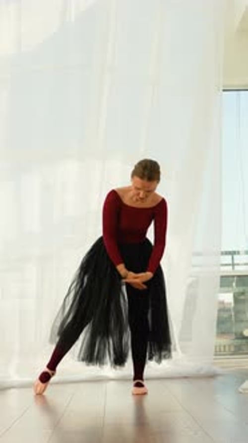 Graceful Ballerina Performing Contemporary Dance Choreography