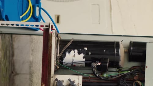 Air Conditioner System Interior Showing Compressors and Wiring