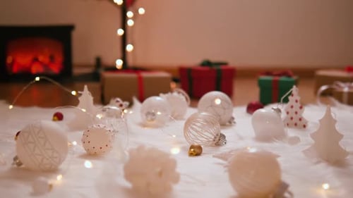 Cozy Christmas Holiday Decorations and Gifts by Fireplace