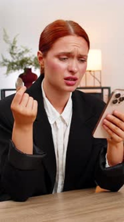 Young Businesswoman Sees Crypto Crash on Smartphone Sighs Over Investment Loss and Very Disappointed