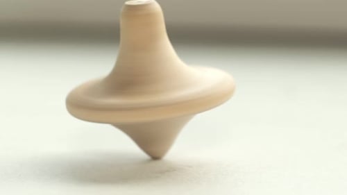Spinning Top Rotating and Falling Over