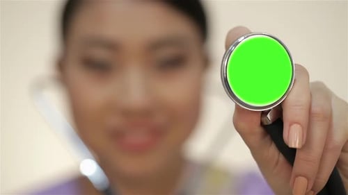 Stethoscope being held by a medical professional