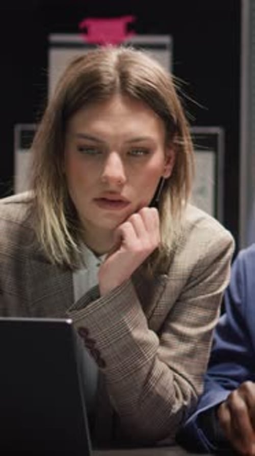 Coworkers Collaborate in Modern Office Setting