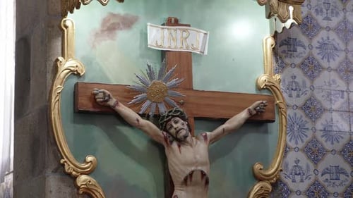 Crucifix of Jesus Christ in an ornate church setting