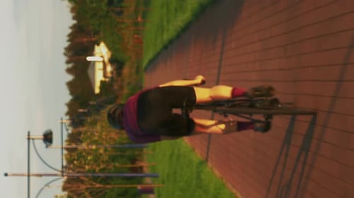 Professional road cyclist sprinting on bicycle