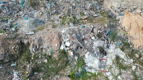 Aerial sliding view pollution of rubbish dump