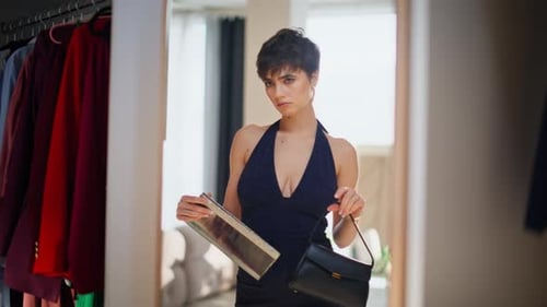 Elegant Woman Choosing Accessories in Home Wardrobe