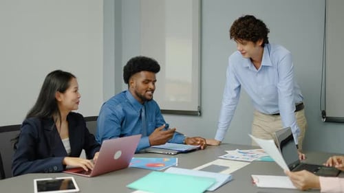 Diverse Business Team Collaborating in Modern Office