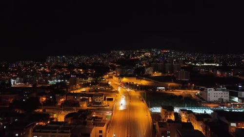 vehicles in night traffic drone view