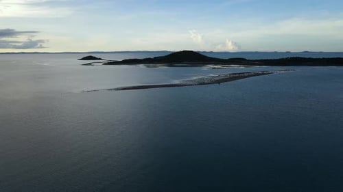 Aerial sunset over remote beach at low tide, far Northern Australia. Clip 2