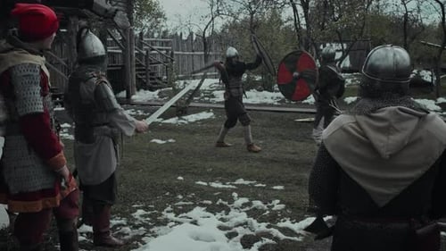 Medieval Reenactors Fighting with Swords and Shields