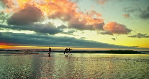 Running, sunset and shadow of friends on beach for holiday, vacation and weekend together