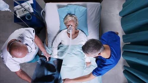 Covid Patient Breathing in Hospital Room