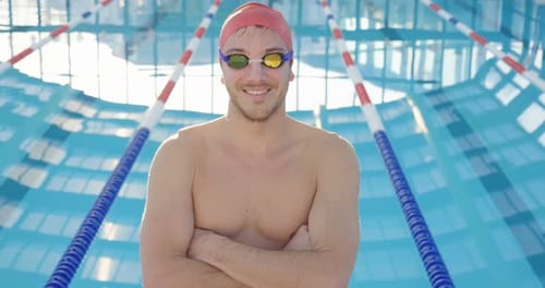 Swimmer Smiling at Indoor Swimming Pool