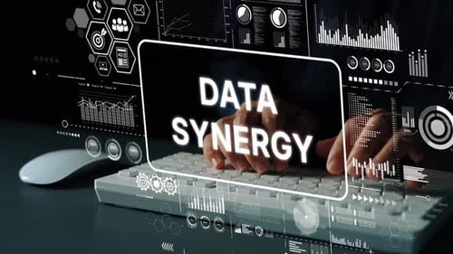 Innovative Data Synergy Concept with Hands on Keyboard and Digital Interface for Modern Business Ana