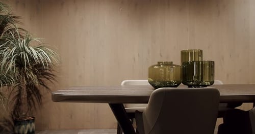 Modern Dining Room with Table, Chairs, and Vases