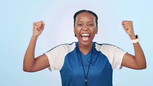 Winner, sports and coach celebrate success or game celebration and achievement against a studio