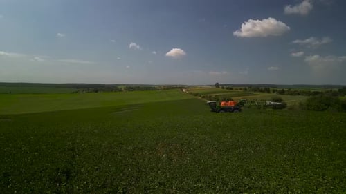 Spray Fertilize On Field With Chemicals In Agriculture Field