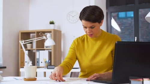 Business, Technology and People Concept - Creative Woman or Developer Working On